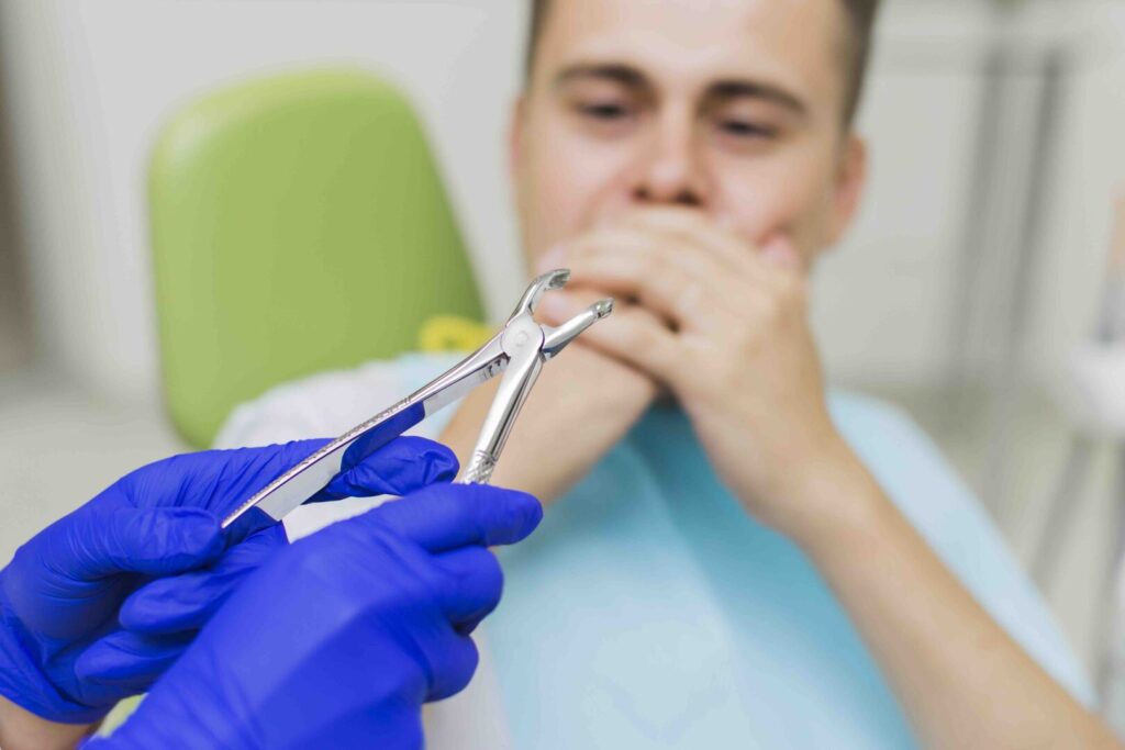 Dolore alle gengive dopo estrazione del dente del giudizio